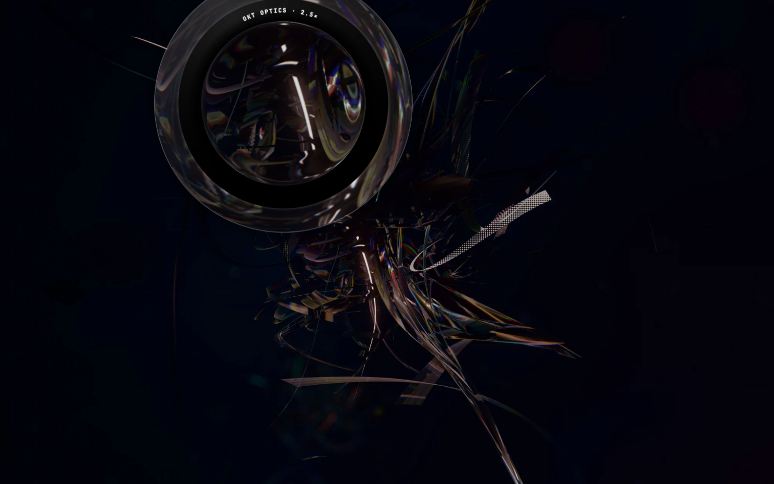 A round glass magnifier lettered OKT Optics 2.5x held over a dark plate of fine iridescent filaments, enlarging the strands beneath it.