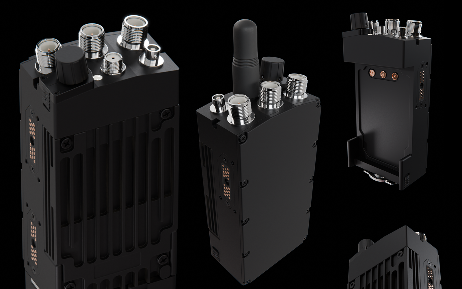 Two black handheld radio units stood on end, their threaded metal antenna connectors catching the light against a black background.